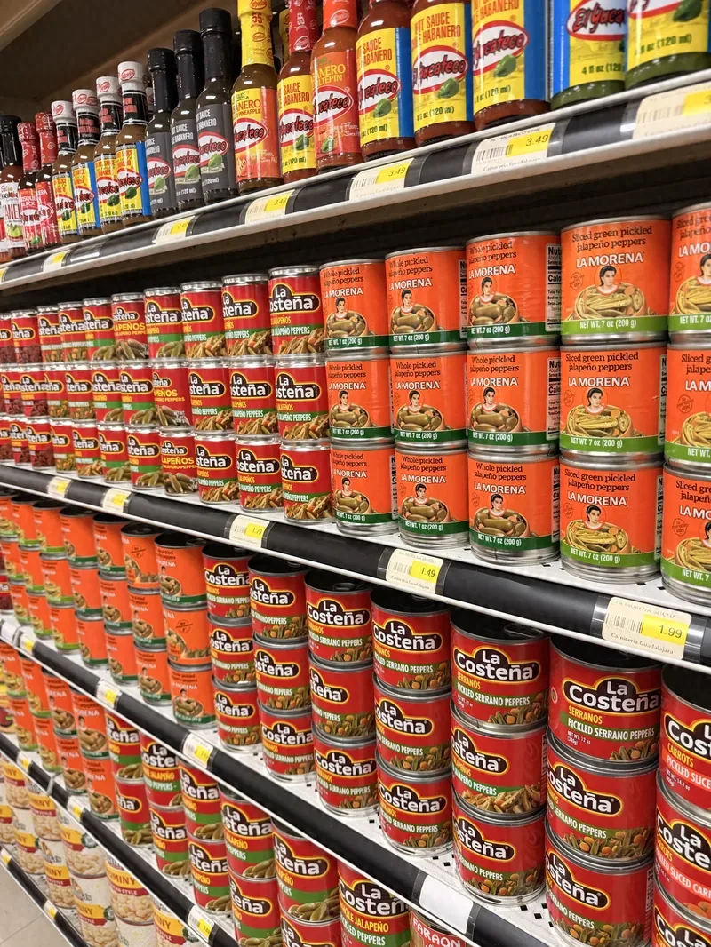 Aisle of Mexican canned chiles and hot sauces at Carniceria Guadalajara